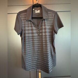 New women’s under armor polo shirt